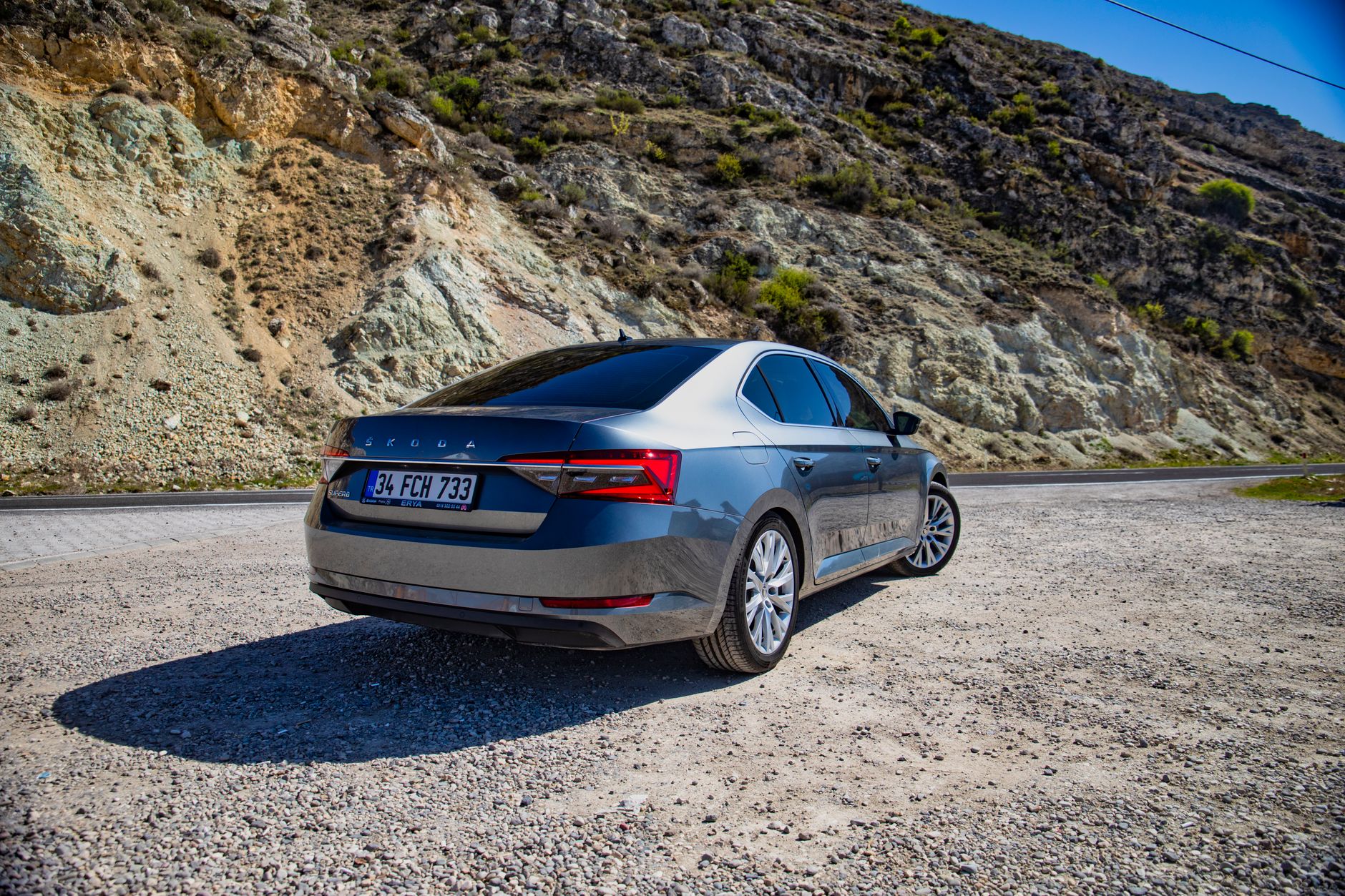 Sleek Skoda Superb parked on a scenic road in Nallıhan, Ankara, Türkiye.